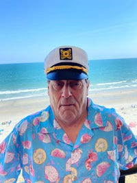 a man wearing a sailor hat